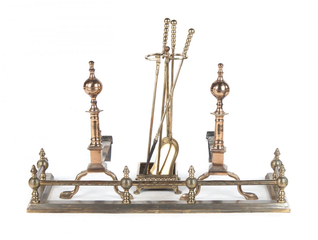 Pair of brass andirons, fire fenders, and tools: pair of bell metal Chippendale style andirons, two brass fire fenders, brass fire tool stand with three tools, and Cape Cod lighter