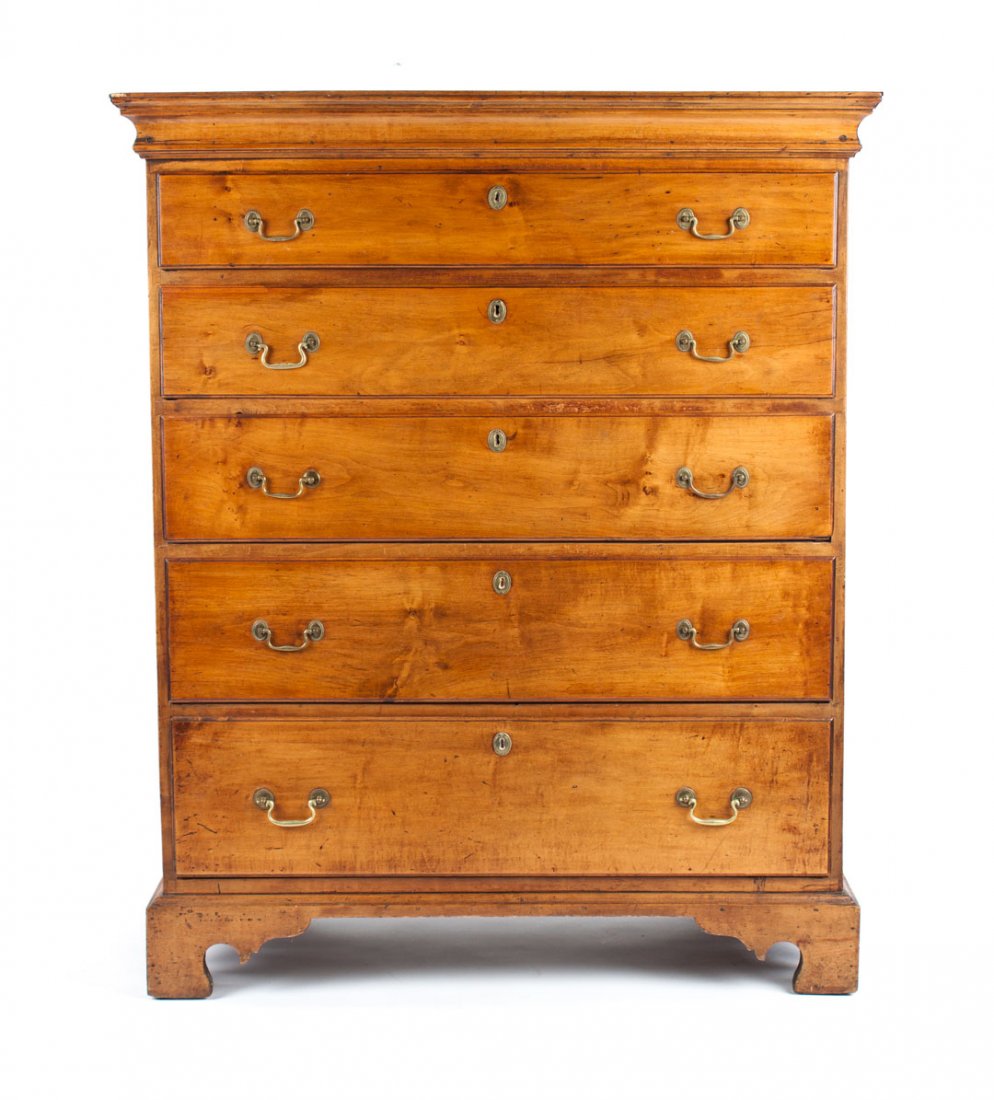 New England Queen Anne style maple tall chest: fourth quarter-18th century; flat top with molded cornice, five graduated drawers in case, straight bracket feet, rosette and bale brasses, 47 1/4 in. H., 39 in. W., 18 in. D.