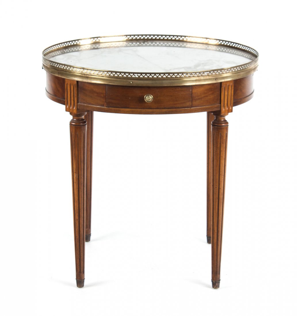 Louis XVI style marble top bouillotte table: 26 1/2 in. round variegated white marble top with pierced brass gallery, short drawer and double candle slides in 3 1/2 in. apron, round fluted and tapered legs, 28 in H.