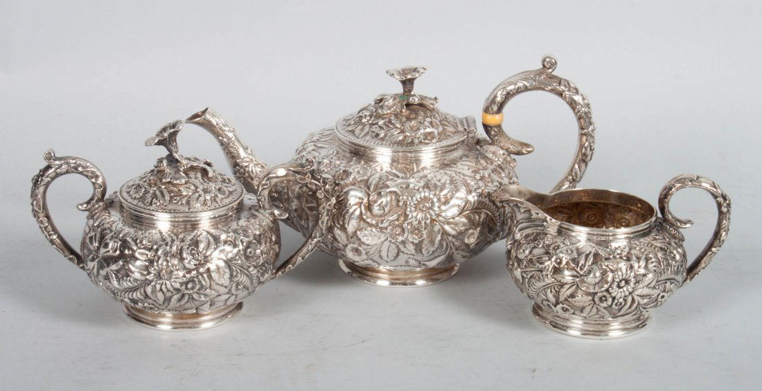 Kirk "Repousse" sterling silver 3-piece tea set: early 20th century, pattern 104, including: teapot (5 in. H.), cream pitcher, and covered sugar bowl, 36.30 ozt