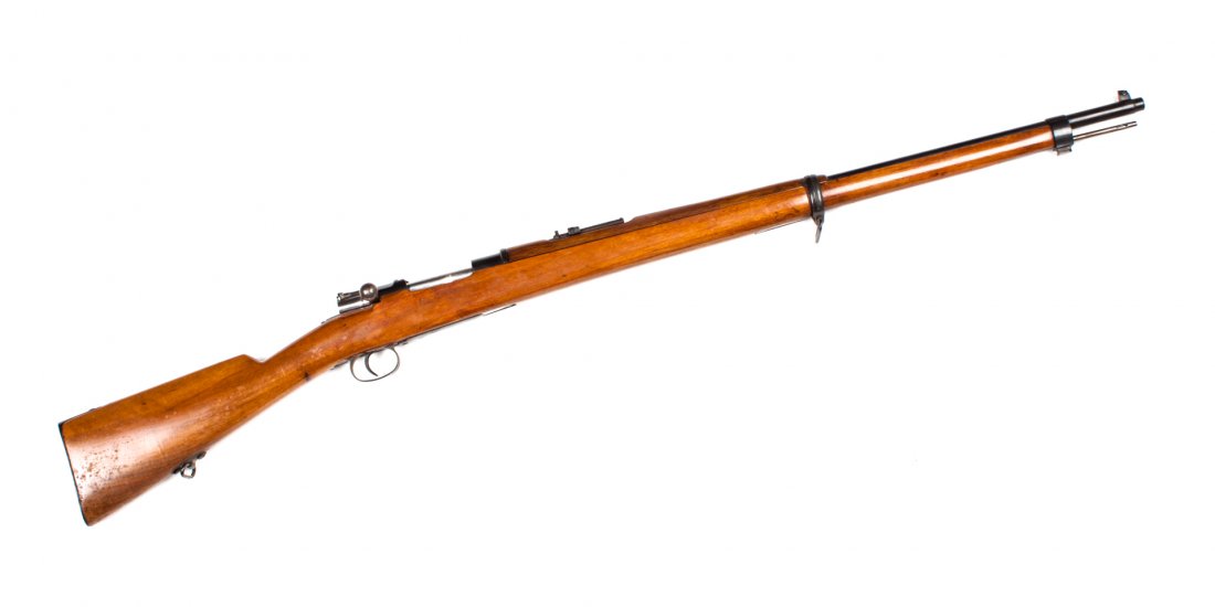 DWM Mauser Model 1893 bolt-action rifle: Spanish type, serial #2484: 7 X 57 mm. cal.; the barrel 29 in. L.; blued metal finish; figured walnut stock and handguard; 48 1/2 in. L. overall