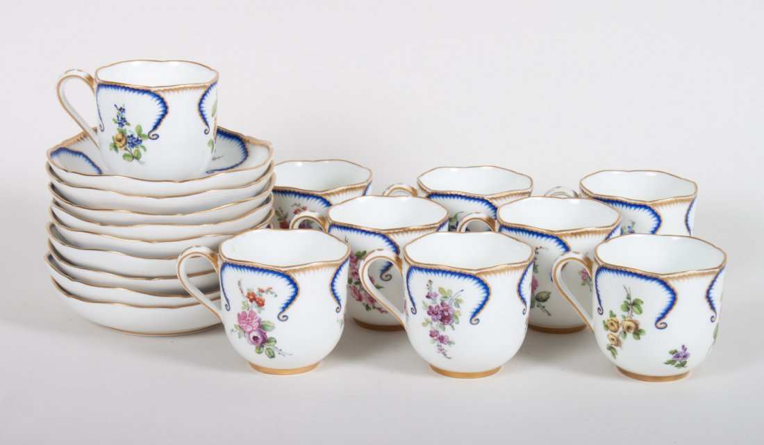 Nine pseudo Sevres porcelain cups and saucers: some with pseudo Sevres mark; floral painted floral decoration with parcel-gilt highlights