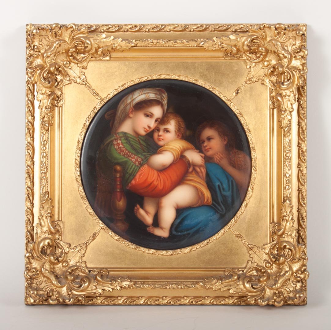 after Raphael. Madonna della Sedia, German plaque: round painted plaque, in elaborate giltwood frame, title on verso, plaque - 7 1/2 in. Diam., frame - 12 in. Sq.