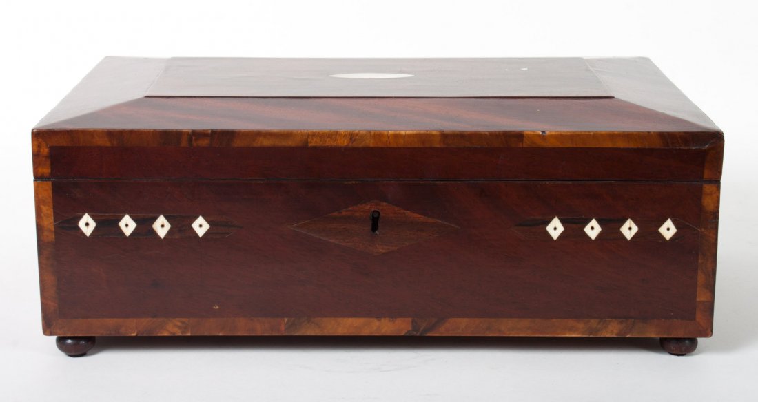American mixed wood sewing box: circa 1870-80; mother-of-pearl and rosewood inlays, unusual fitted interior with four removable lids, each impressed "E. Griffin," with unusual thread feature of spindles to hold spools with threads c