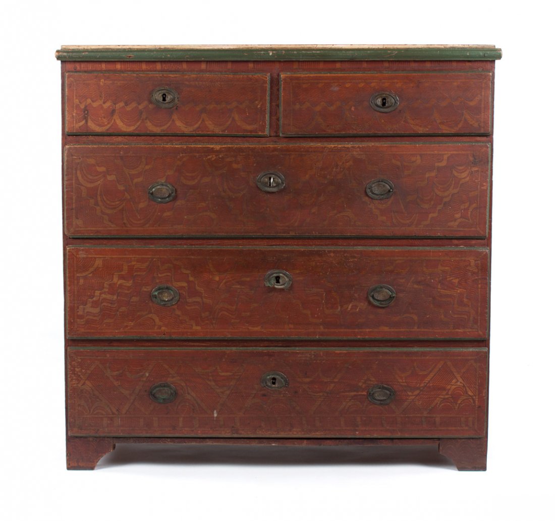 Scandinavian paint decorated chest of drawers: 19th century; flat top with ivory ground with blue stylized floral design, case has two short and three long drawers, straight bracket feet and stamped oval plate and bale brasses, brown ground with g