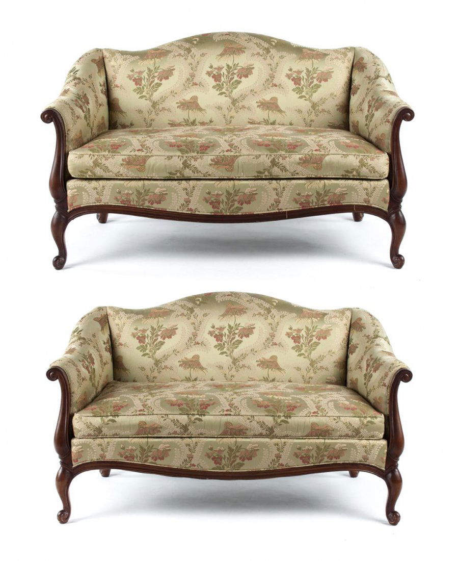 Pair of George II style mahogany settees: camelback settees with floral brocade style upholstery, scrolled arms and legs, Hickory Chair Co., 58 in. W.