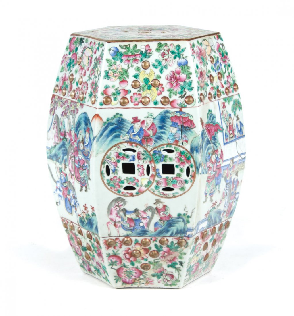 Chinese Export Rose Mandarin porcelain garden seat: circa 1870; hexagonal form with pierced seat and sides, fruit and flower borders with elaborate court scene decoration, 20 in. H., 11 in. W.