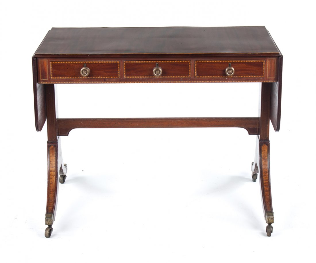 Regency mahogany drop-leaf sofa table: early 19th century; three drawers in 4 in. apron, banded and stringer inlay overall, trestle base with double splayed legs connected by stretcher, 27 in. H., 35 in. W., 20 in. D., with 12 in. drop lea