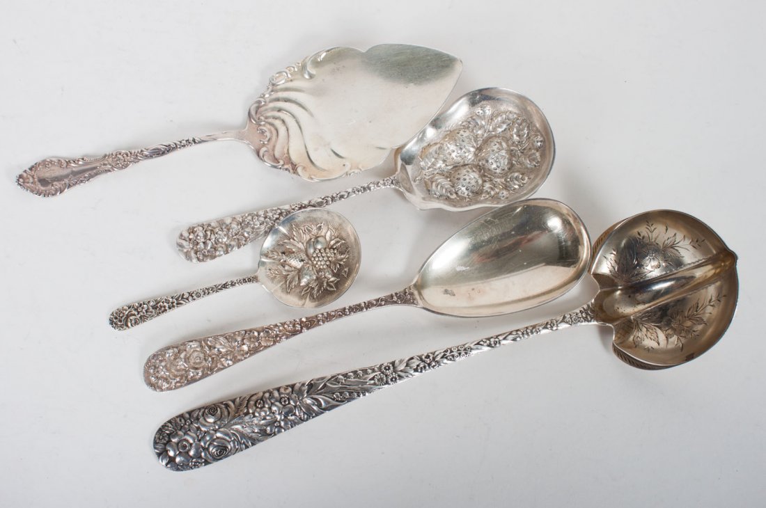 Five American sterling silver serving pieces: including: Stieff "Rose" serving spoon and berry spoon, Kirk "Repousse" bonbon spoon, J.G. Gehring & Son soup ladle, and a pie spade (maker's mark rubbed); 14.0 ozt.