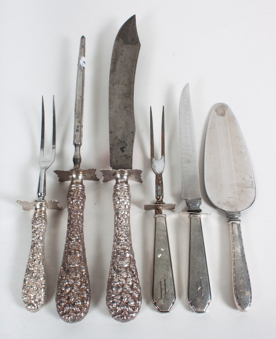 Group of six sterling handled serving pieces: including: Baltimore Silver Co. (predecessor to Stieff) "Rose" large carbon steel carving knife & sharpener, Stieff "Rose" stainless carving fork, 2-piece stainless small carving set, and a stainless 