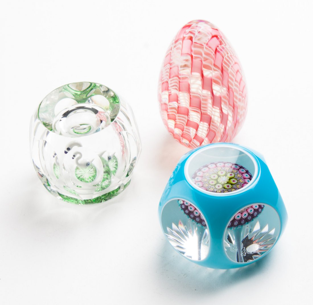 Three art glass paperweights: including: Pertshire swan, Orient & Flume egg-shaped paperweight, and a Baccarat millefiori mushroom