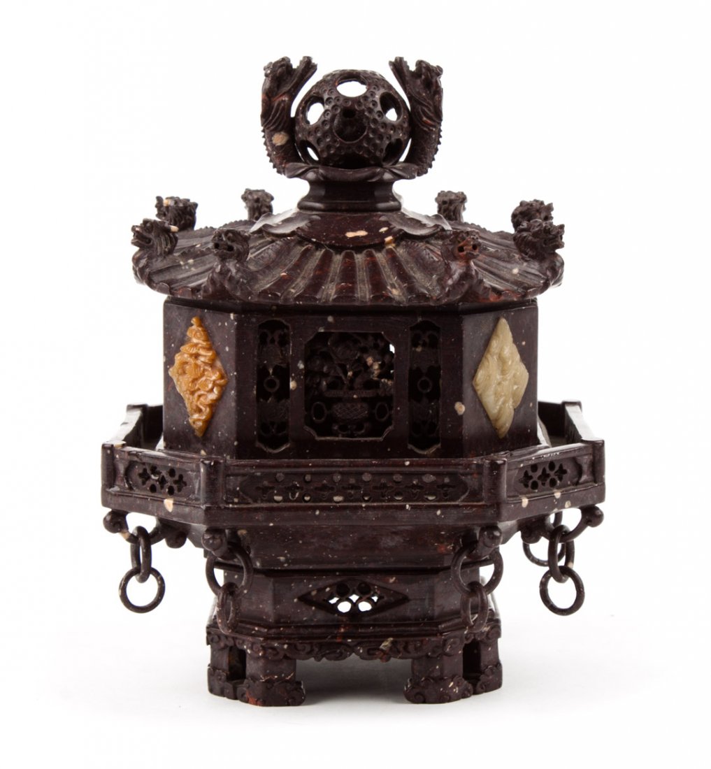 Chinese carved soapstone pagoda chop case: pagoda case with removable lid with puzzle ball knop, interior holds 11 hardstone chop seals, 6 in. H., 5 in. W.
