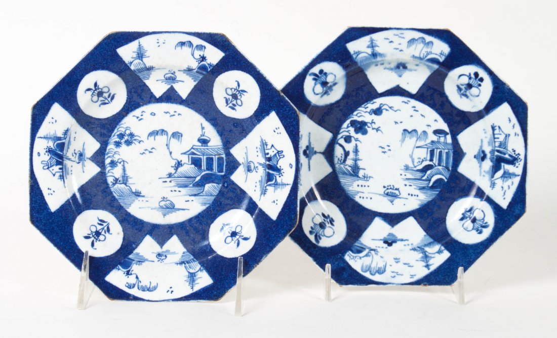 Pair of Worcester china chinoiserie plates: Doctor Wall period, circa 1760; blue and white decoration with pagodas and river scene vignettes and pseudo Chinese reign mark, 6 1/2 in. Diam.