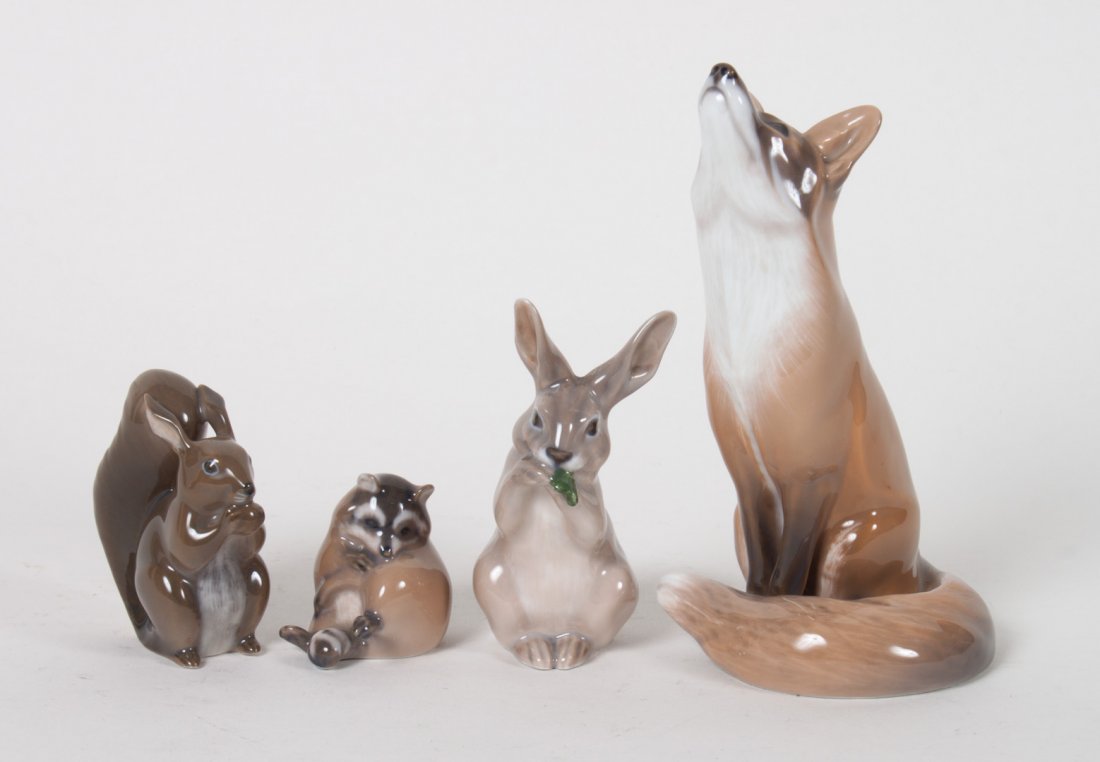 Four Royal Copenhagen porcelain forest animals: including: fox, long-eared forest squirrel, rabbit, and raccoon, 1 1/2 to 5 in. H.