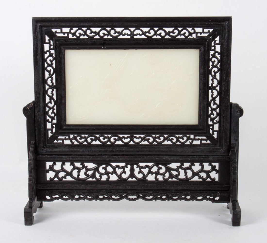 Chinese miniature wood and jade table screen: carved wood two-part screen with inset square jade plaque, 14 in. H., 15 in. W.