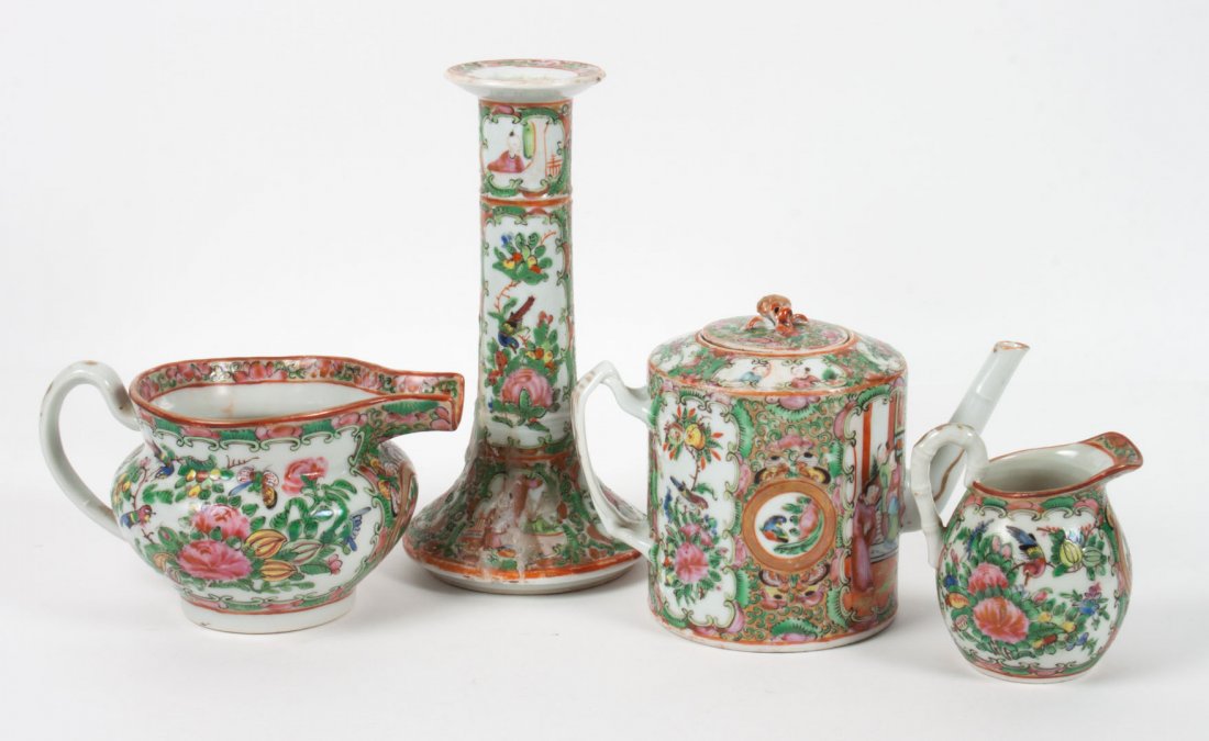 4 Chinese Export Rose Medallion porcelain articles: fourth quarter-19th century; comprising: candlestick, teapot, hog snout creamer, and cream jug