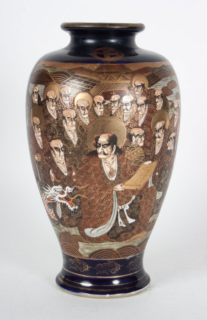 Japanese Satsuma earthenware vase: early 20th century; cobalt ground, with "Immortals" decoration, 10 in. H.