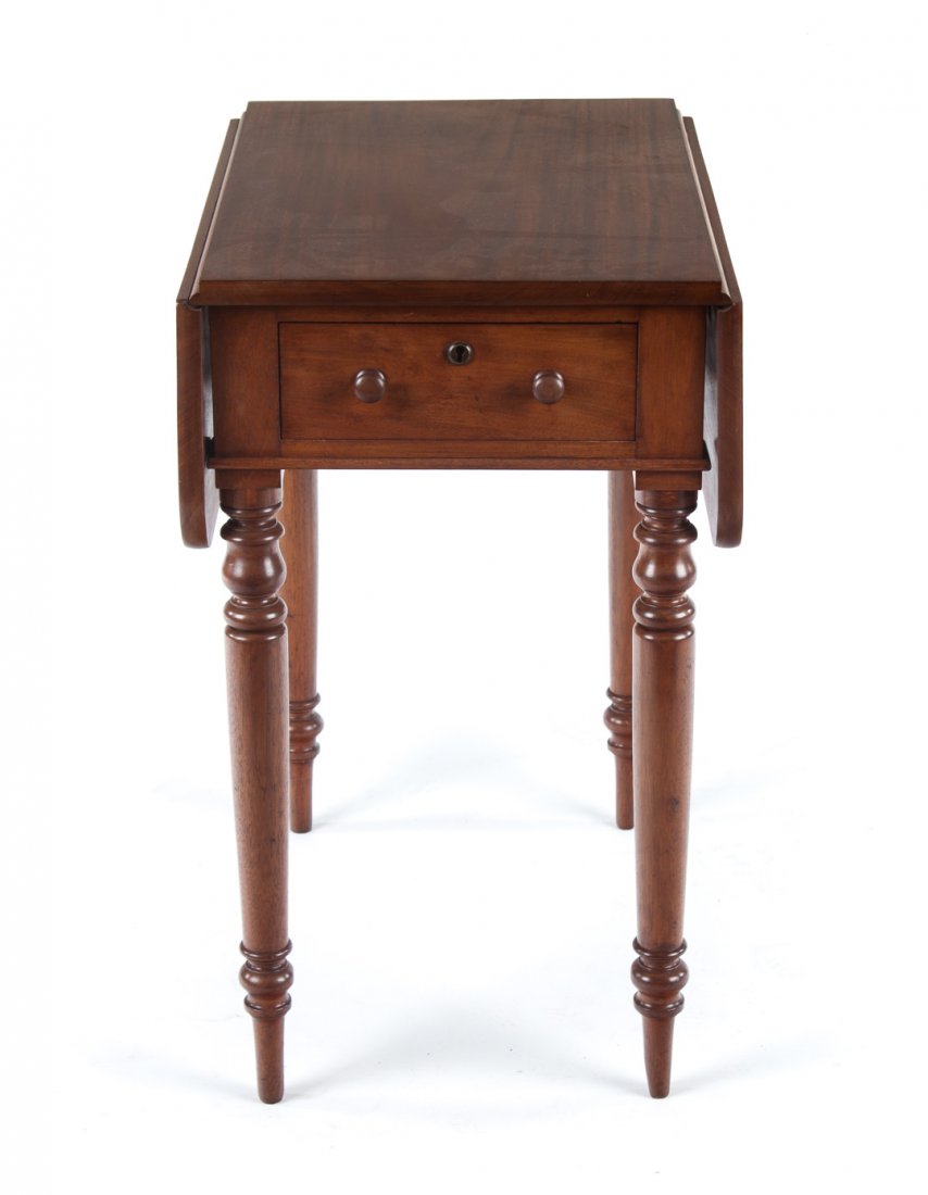 George IV mahogany drop leaf side table: circa 1820; 15 3/4 in. top with two 8 3/4 in. drop leaves, short drawer in apron, four round, turned, and tapered legs, 29 1/2 in. H., 24 in. W.