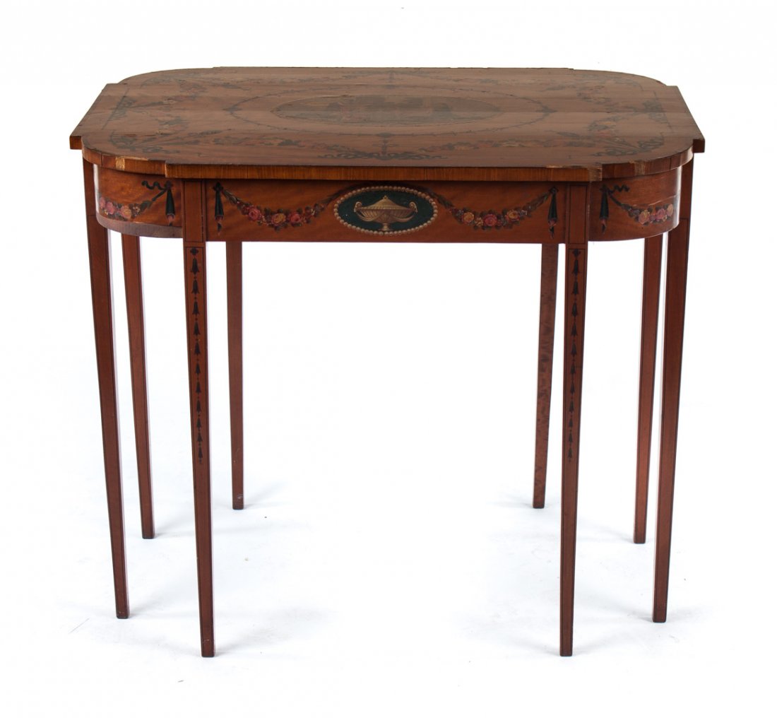 Edwardian Adam style satinwood side table: late 19th/early 20th century; shaped top with inlaid edge and painted floral garlands and reserved panel with maiden and ladies in waiting, urn and floral garland painted apron, eight straight tapered