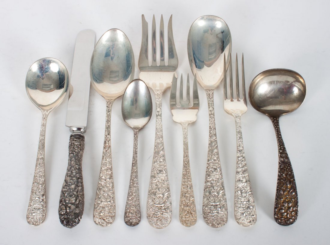 Partial set of Stieff "Rose" sterling flatware: comprising 78 pieces, including: 12 knives (8 7/8 in. L., stainless blades), 9 forks (7 in. L.), 6 salad forks, 17 teaspoons, 12 soup spoons, 6 individual lemon forks, 2 gravy ladles, 2 sauce ladles, 