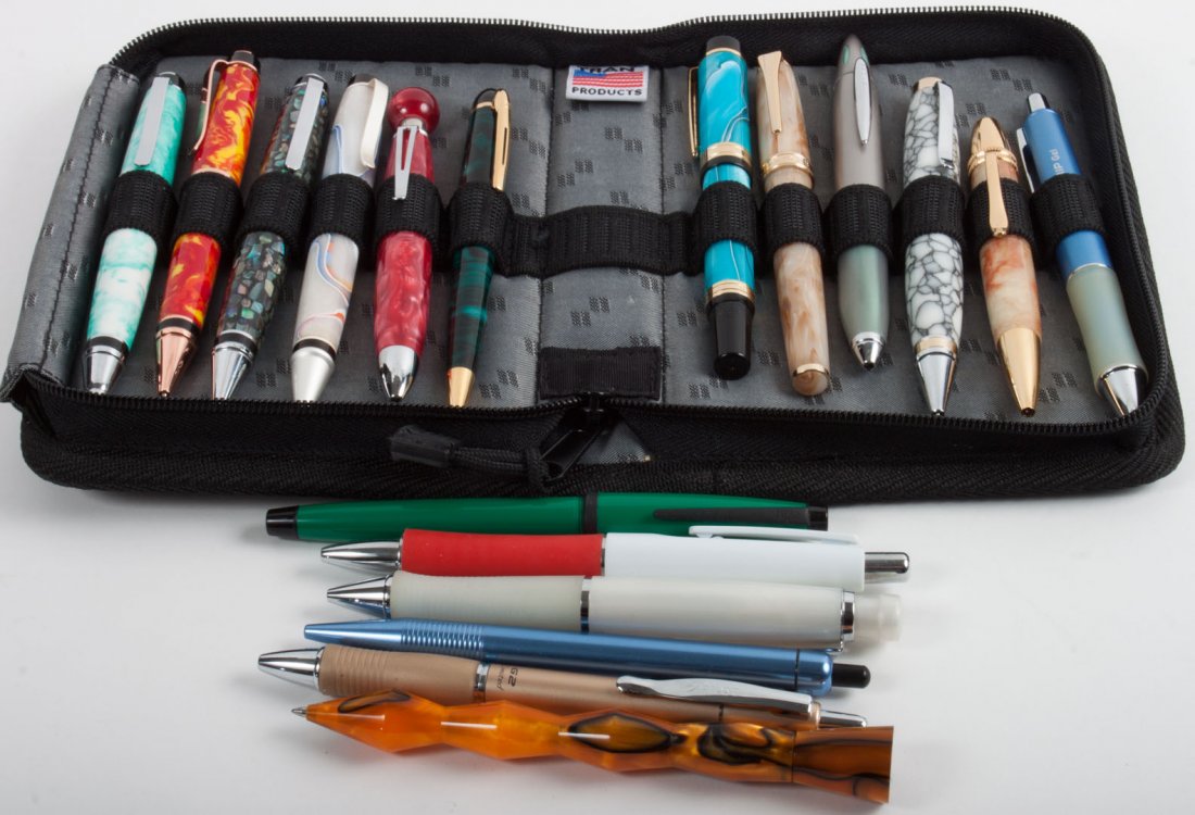 18 assorted roller ball pens: makers include: Levenger, Paper Mate, and others, with cloth 12 pen folding case