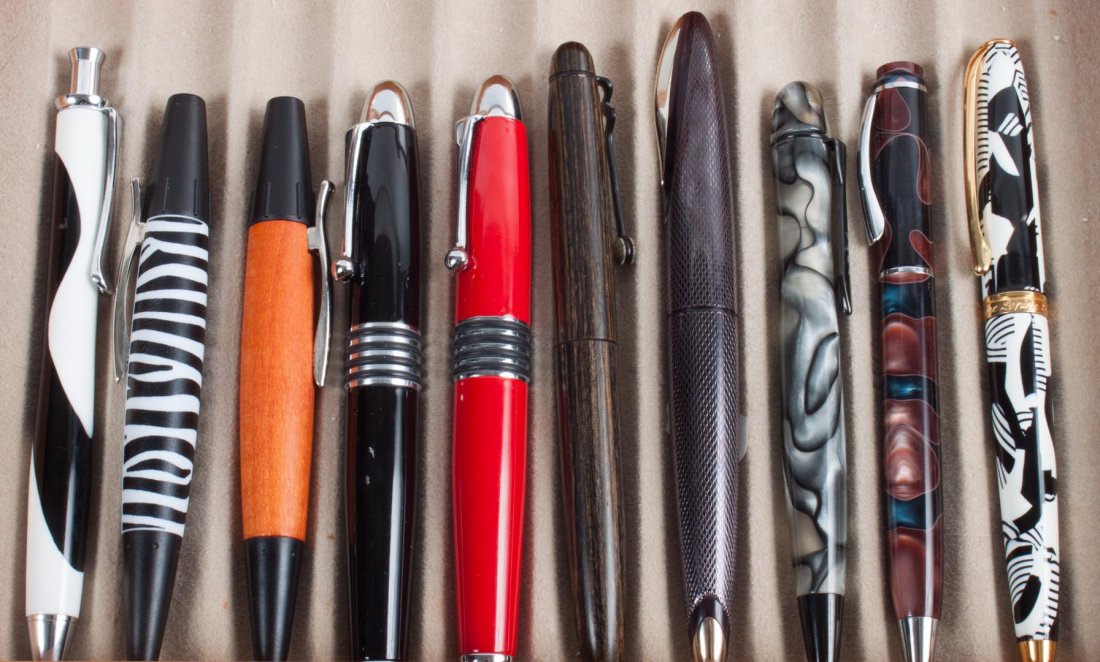 Wood and glass pen display case & 10 pens: maple case with lift glass lid, velvet lined interior with spaces for ten pens, with ten quality roller ball pens