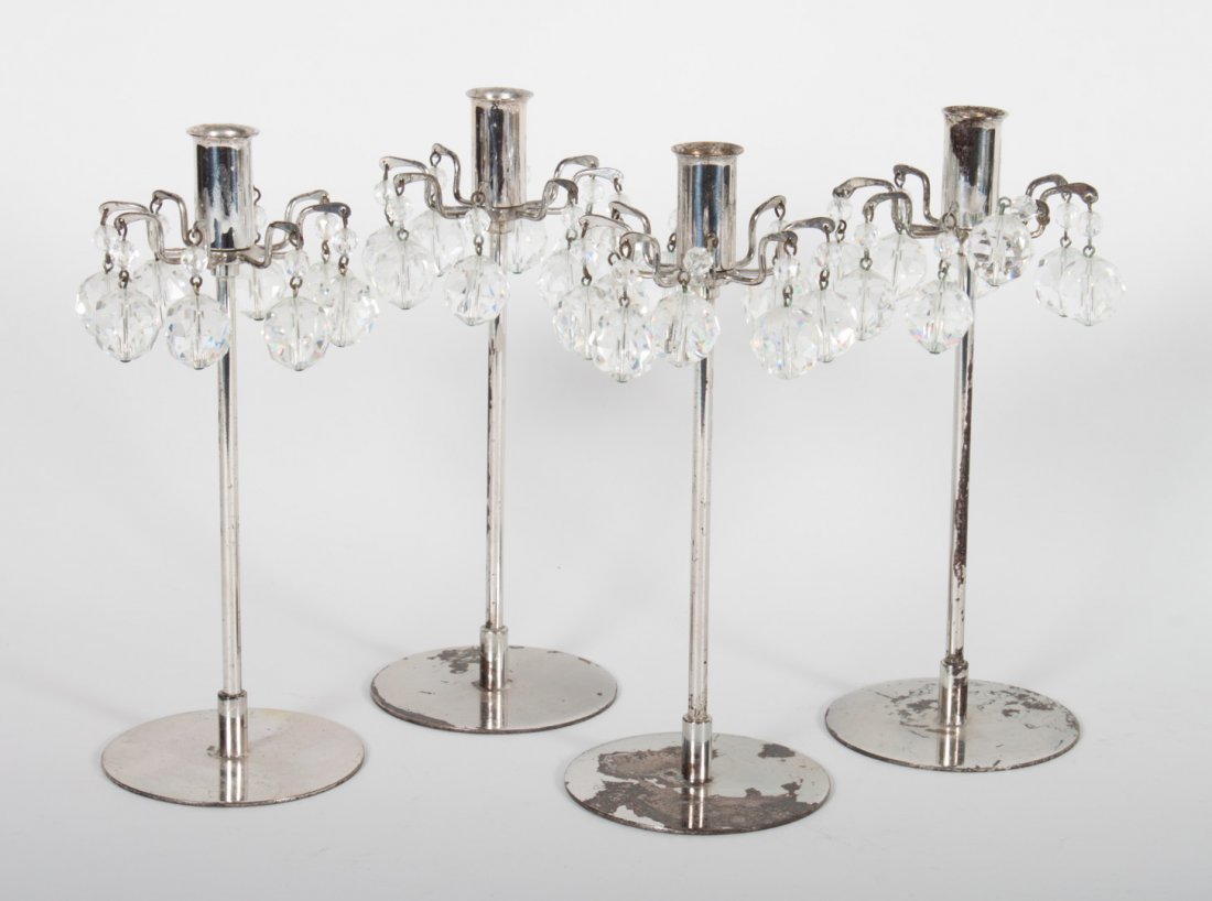 Four Lobmeyr chrome and crystal candlesticks: second half-20th century; chrome shaft and base with eight crystal spherical prisms, impressed mark on base, 6 1/2 in. H.