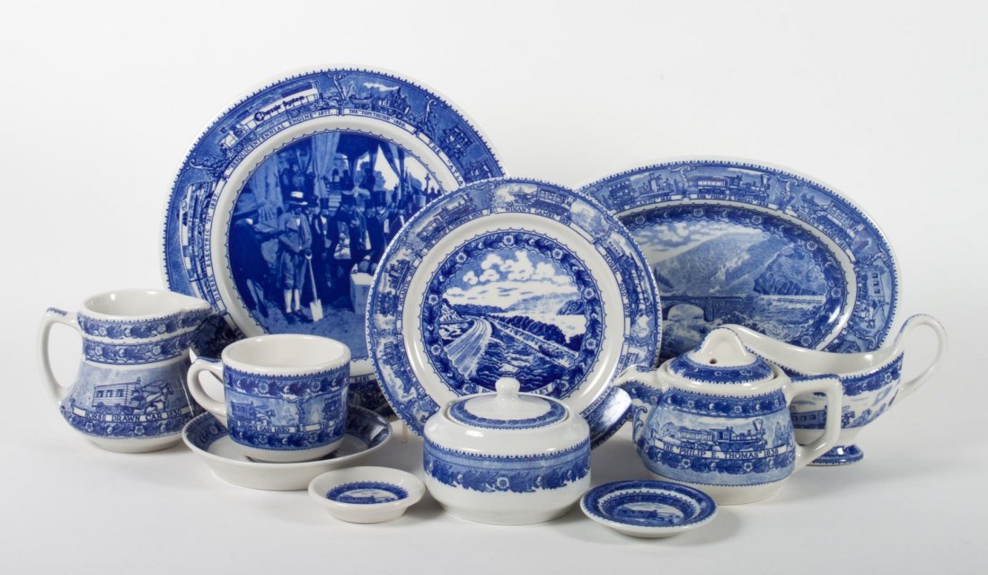 Shenango B & O china tableware: 32 pieces, including: 8 dinner plates, dinner plate with B & O Charter, 6 coffee cups and 7 saucers, 2 gravy boats, teapot, creamer and sugar bowl, 2 luncheon plates, small platter, and 2 butter pats