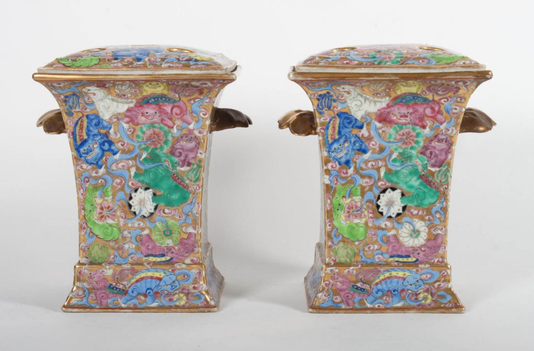Pair of Chinese Export porcelain bough pots: circa 1825; gilt ground with polychrome foo dog and flower decoration, 8 1/2 in. H., 6 in. Sq.