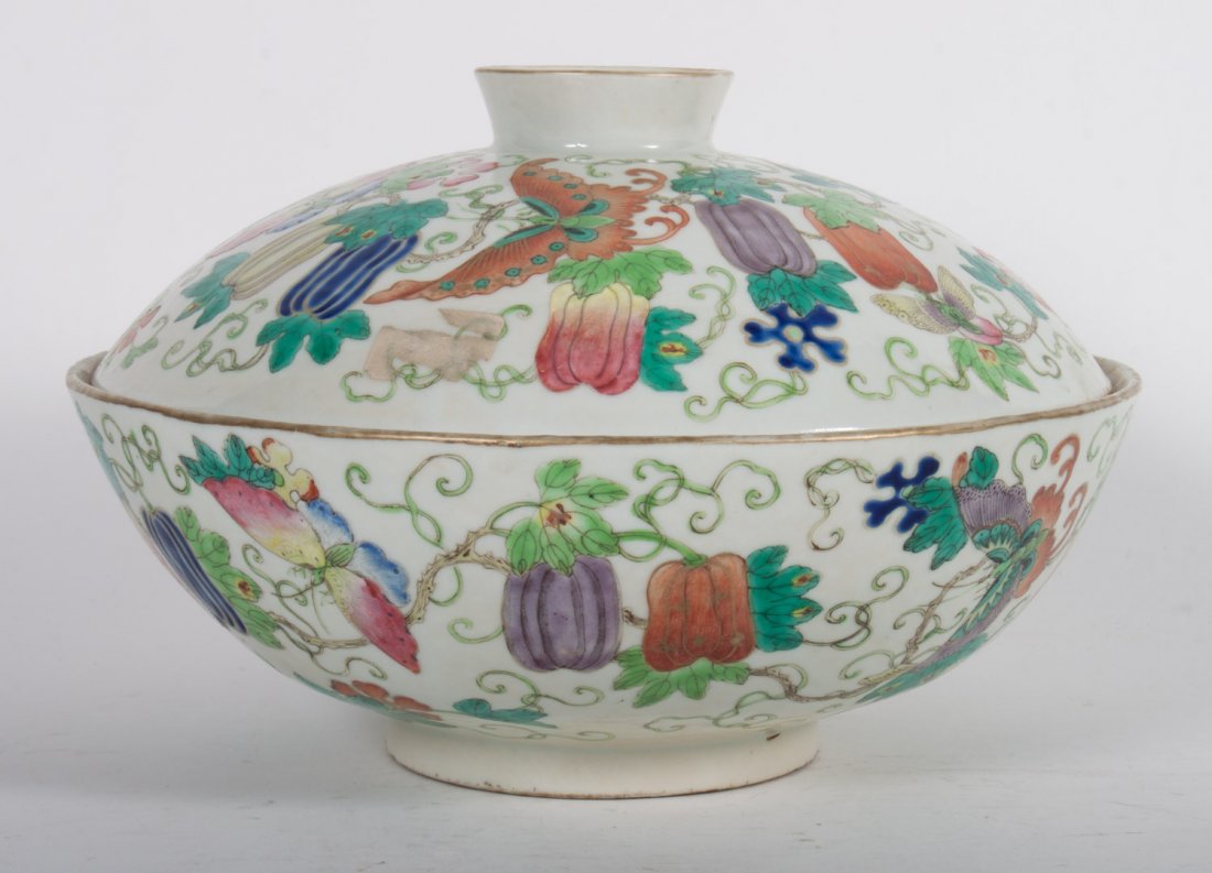 Chinese Export Wucai porcelain sectional bowl: late 19th century; covered bowl with exterior having polychrome, fruit, and butterfly decoration, five-section interior with sepia bat decoration, 6 in. H., 9 1/4 in. Diam.