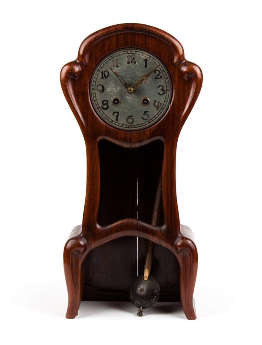 Arts & Crafts rosewood mantel clock: first quarter-20th century; silvered metal dial with pseudo Tiffany mark, 19 1/2 in. H.