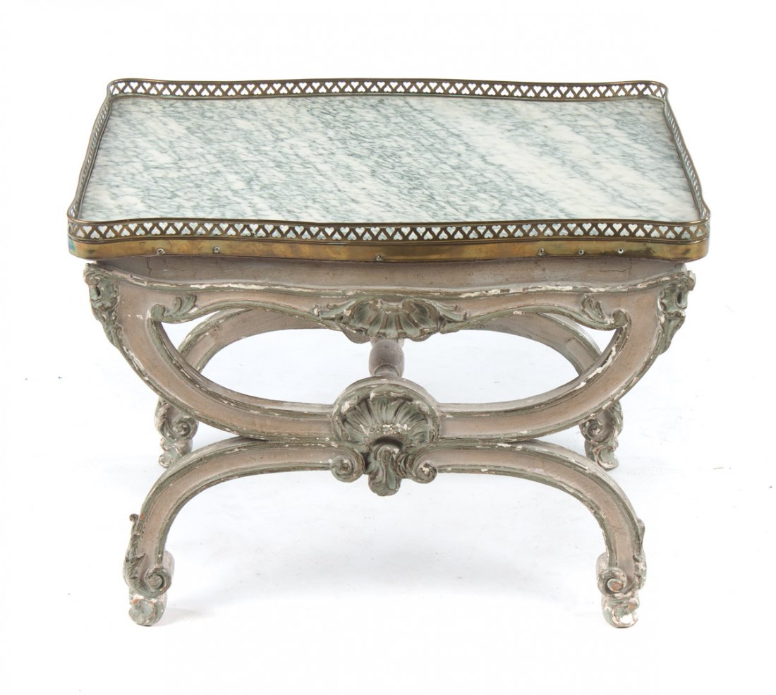 Louis XV carved and painted wood tabouret: late 18th century; grey and white variegated marble top with raised gallery edge, painted shell carved curule base, connected by round turned stretcher, 17 1/2 in. H., 24 in. L., 18 in. D.