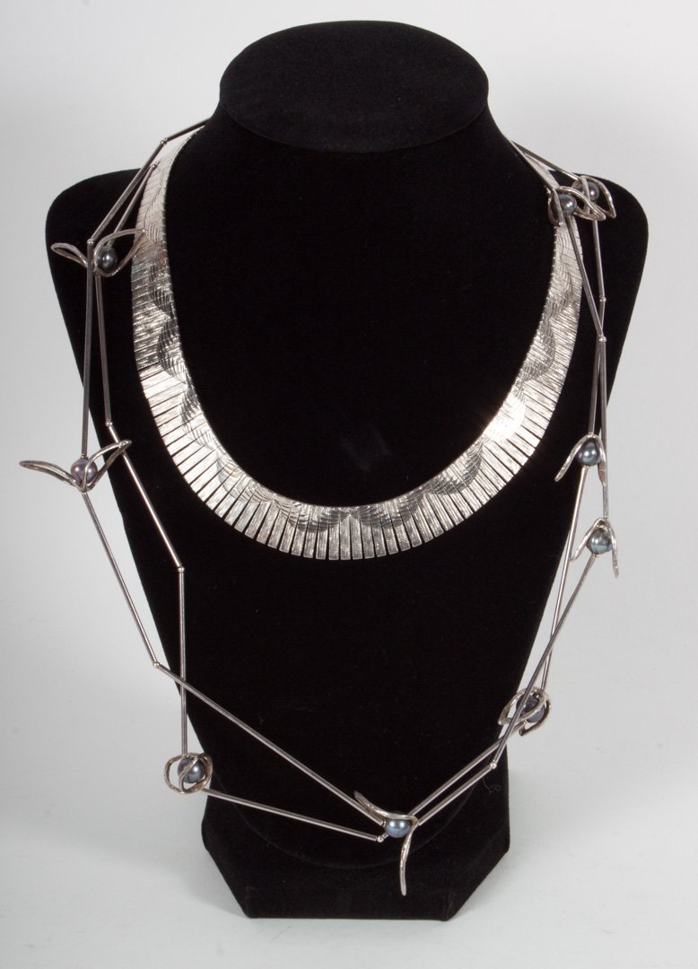 Michelle liquid sterling silver bead necklace: with ten round black pearls, 46 in. L., together with an Italian brushed sterling silver bib necklace, 16 in. L., 64 grams t.w.