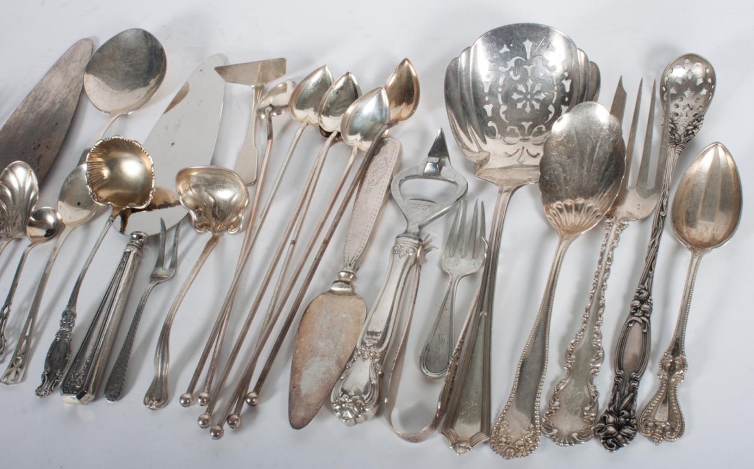 Assortment of American sterling silver flatware: comprising 25 pieces, notably: Gorham, Kirk and others; together with 3 sterling handled and two plated items; 19:30 ozt of weighable silver