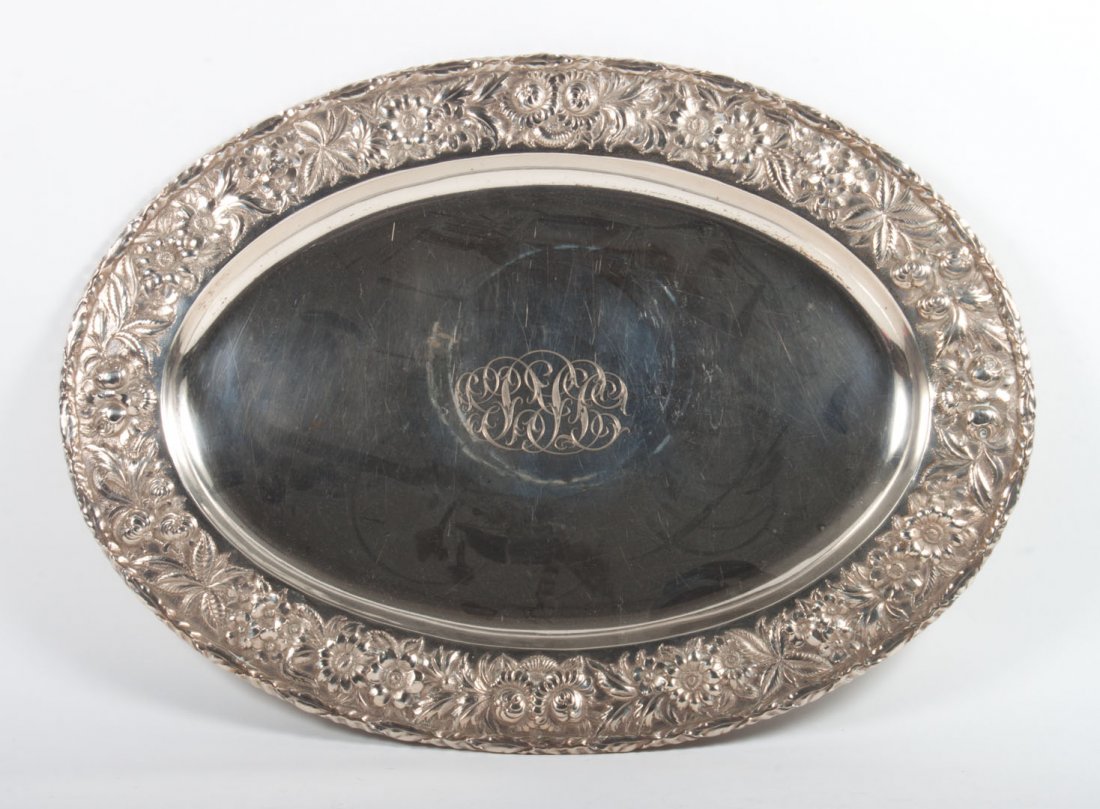 Kirk oval repousse sterling silver meat platter: 15 in. H. x 21 in. W., 74.25 ozt.