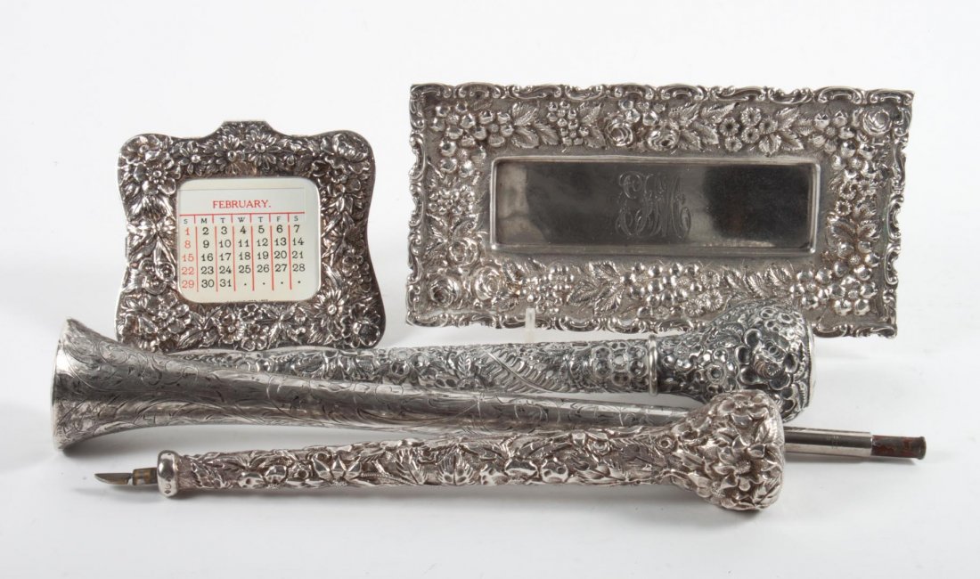 Jacobi & Jenkins sterling silver vanity tray: 3 3/4 in. H. x 7 in. W., together with a Kirk sterling perpetual calendar and three weighted sterling silver umbrella handles, 5.35 ozt. of weighable silver