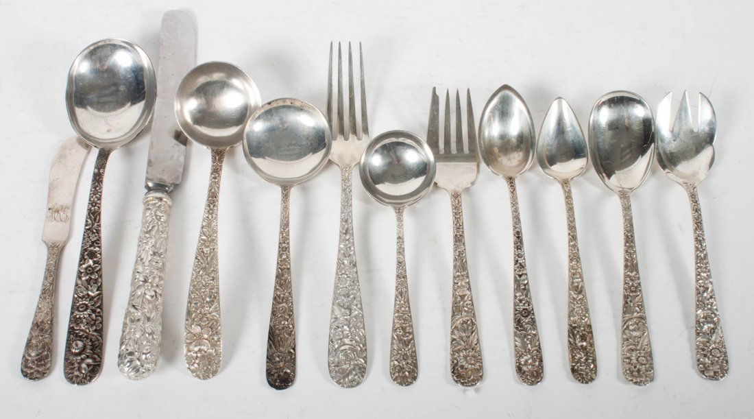 Group of Kirk sterling silver flatware: in the "Repousse" pattern, comprising 91 pieces, including: 6 knives with stainless blades, 7 forks, 9 salad forks, 4 ice cream forks, 12 teaspoons, 20 fruit spoons, 3 gumbo spoons, 5 soup spoons, 5 b