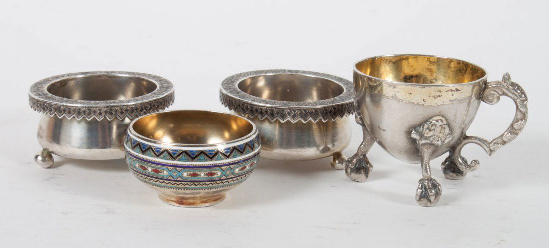 Pair of Russian niello silver trench salt cellars: Moscow, 1877, indistinctive makers mark; together with a Russian enameled silver salt cellar, St. Petersburg, late 19th century, and an unmarked silver-plated egg cup; 5.65 ozt.