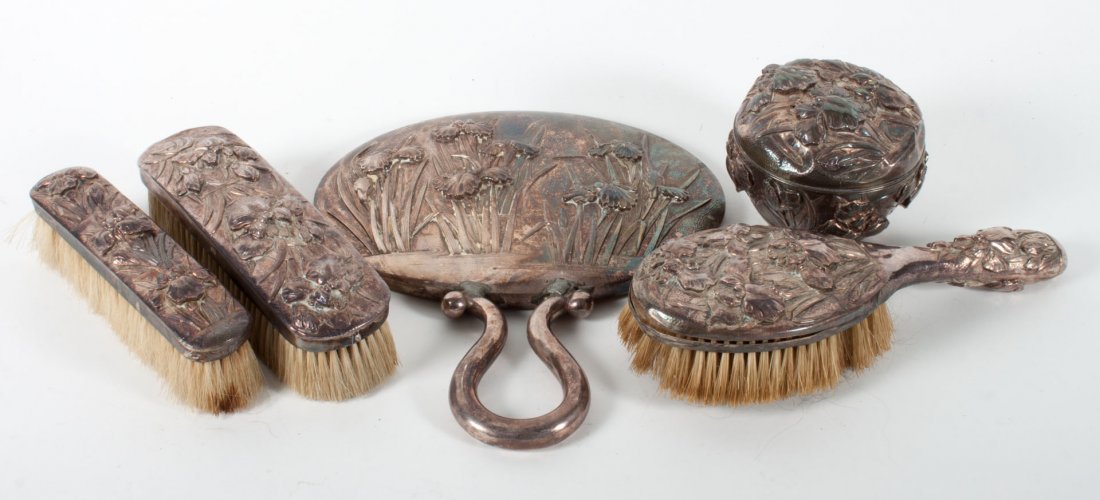 Japanese silver 5-piece dresser set: Meiji period, late 19th or early 20th century, including: hand held mirror (repaired), hair brush, garment brush, shoe brush and a vanity jar