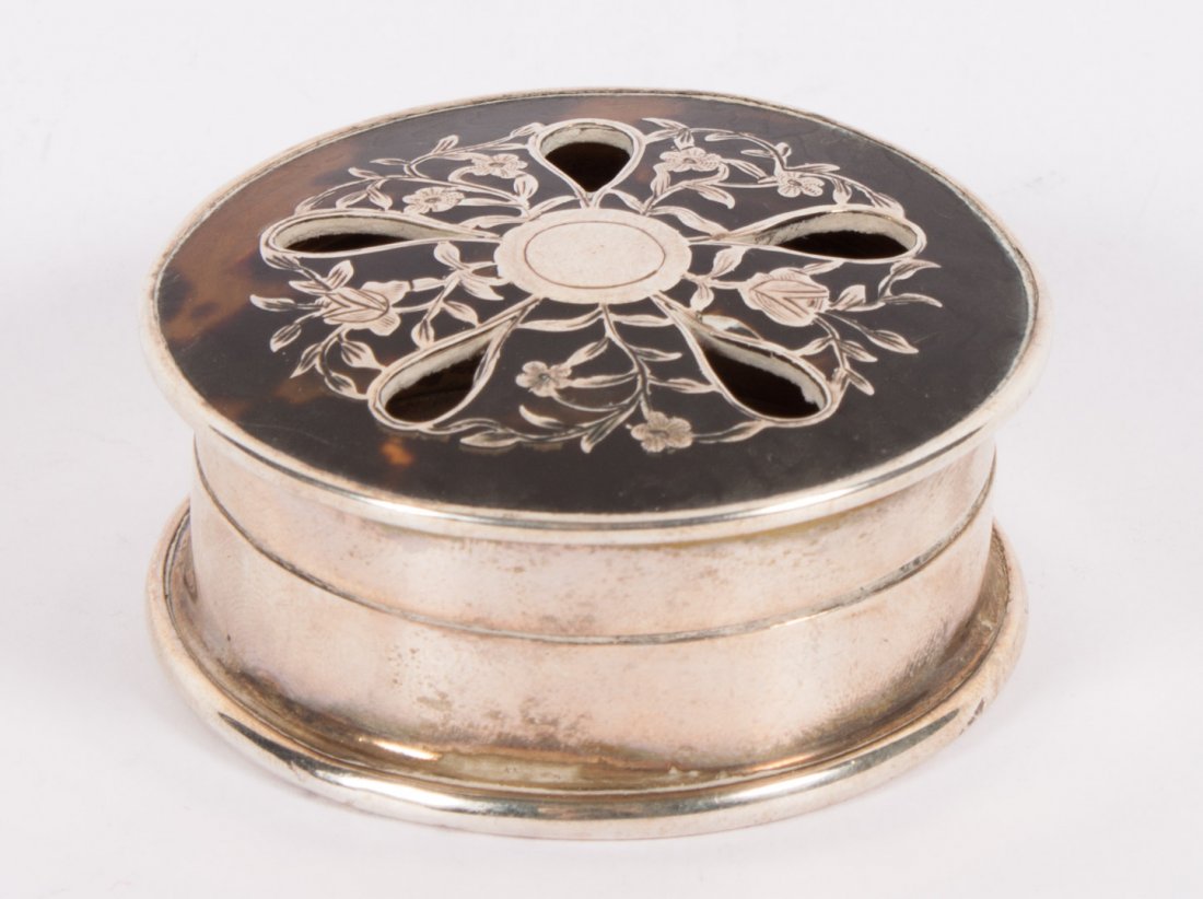 Regency silver and silver inlaid box: circa 1815; circular potpourri box with silver floral inlay, 2 in. Diam.