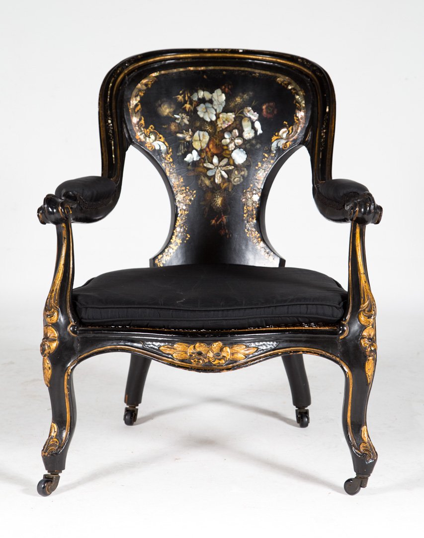 English Rococo Revival black lacquer armchair: circa 1860; black parcel-gilt ground, mother-of-pearl inlaid floral decorated arched curved back, caned seat, scrolled arms, cabriole legs, 31 1/2 in. H., 23 1/2 in. W., 22 1/2 in. D.