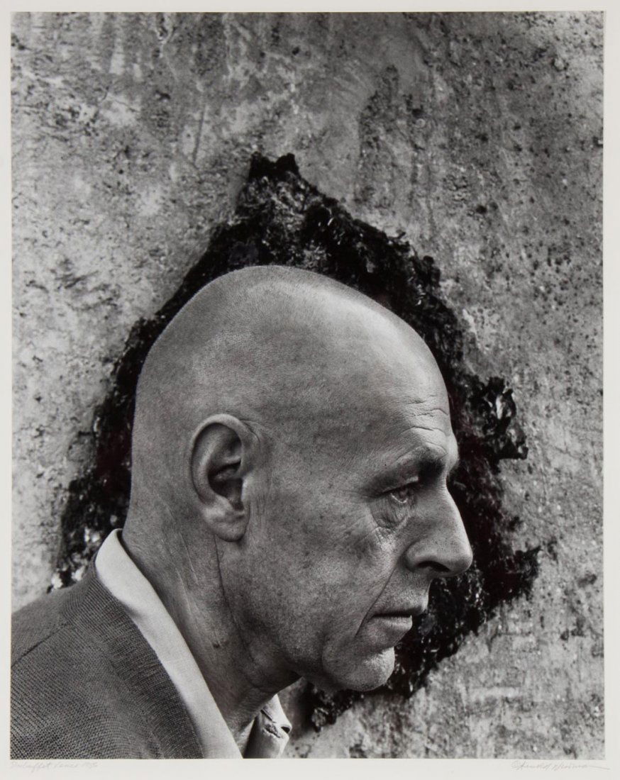 Arnold Newman "Jean Dubuffet," photograph: (American, 1918-2006). Silver gelatin print, signed "Arnold Newman" lr, titled and dated "Dubuffet, Vence, 1956" ll, 19 1/2 x 15 1/2 in., framed. The Lily Gallery, Inc., Baltimore, MD stamp on verso
