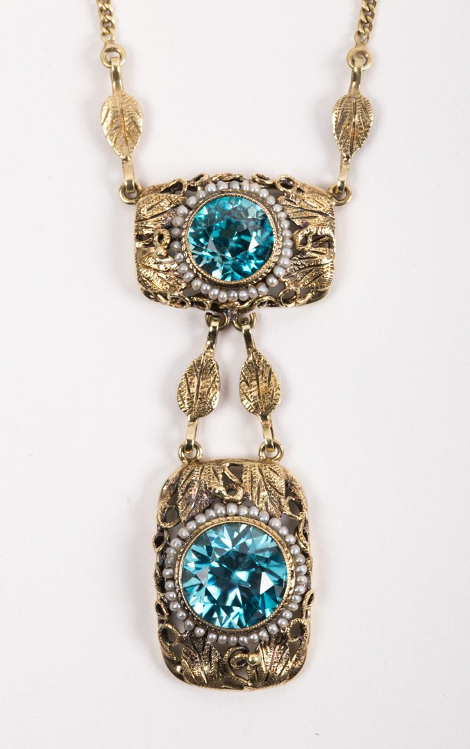 An Art Deco Seed Pearl & Blue Zircon Necklace: in 14K gold