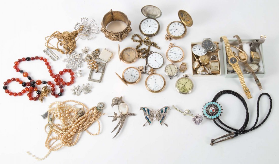 A Collection of Jewelry Including Carnelian Beads: Bag of fashion jewelry including carnelian beads, sterling brooches, and pocket watches