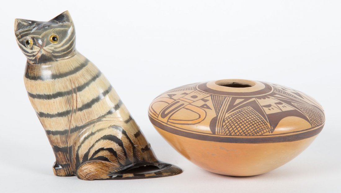Pueblo pottery seed pot and a carved horn cat (1 of 6)