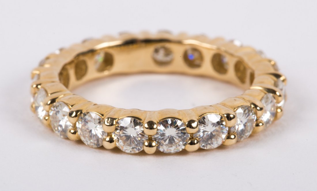 A Moissanite Eternity Band: 14k, size 5 1/2.