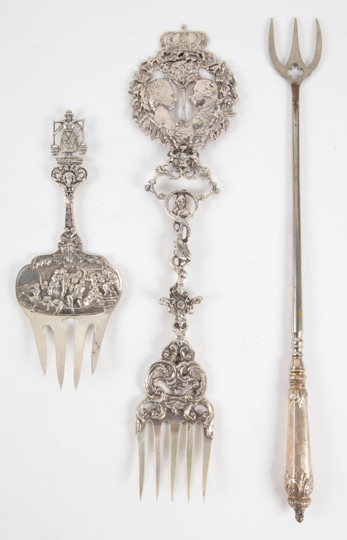 Two Dutch silver figural serving forks (1 of 7)