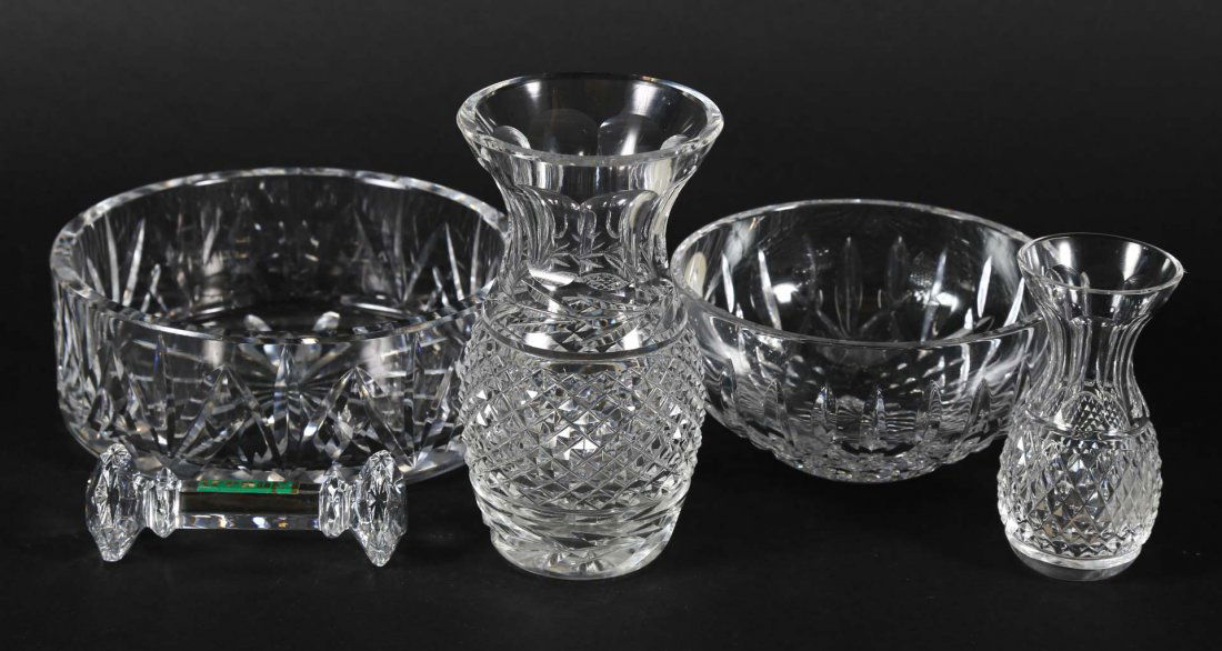 Five assorted Waterford crystal articles: including: 2 miniature vases, finger bowl, wine bottle coaster, and knife rest, 6 in. H. of tallest