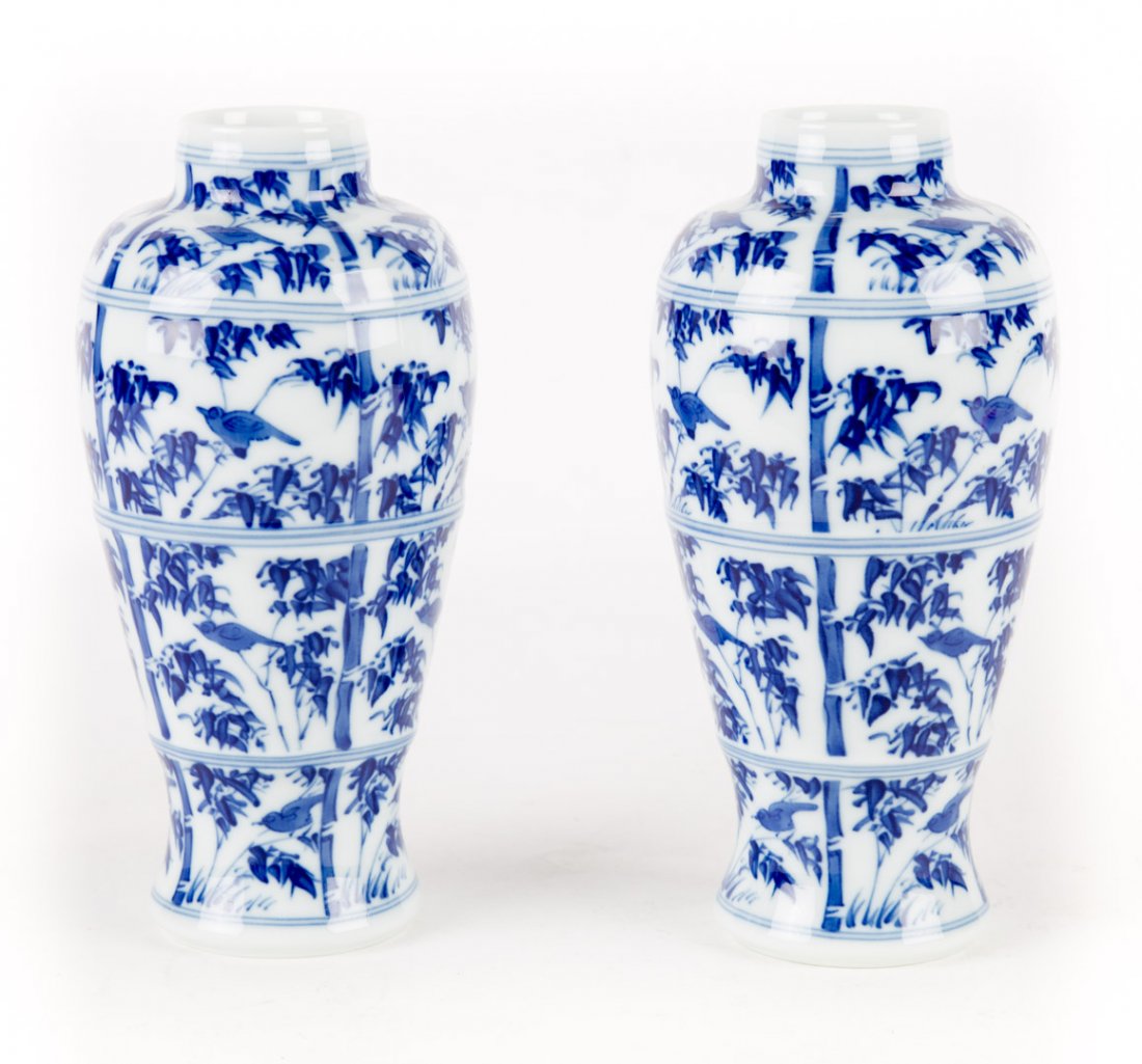 Pair of Mottahedeh porcelain jars: blue and white bird and bamboo decoration in the Chinese Export manner, 9 in. H.
