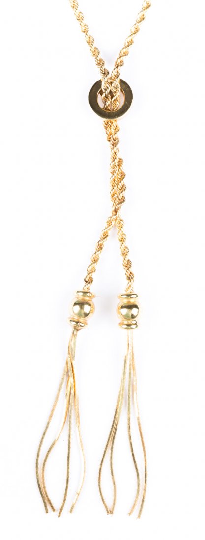 An Italian Rope Chain Necklace with Tassel 14K: 24 in. L., 9 grams t.w.